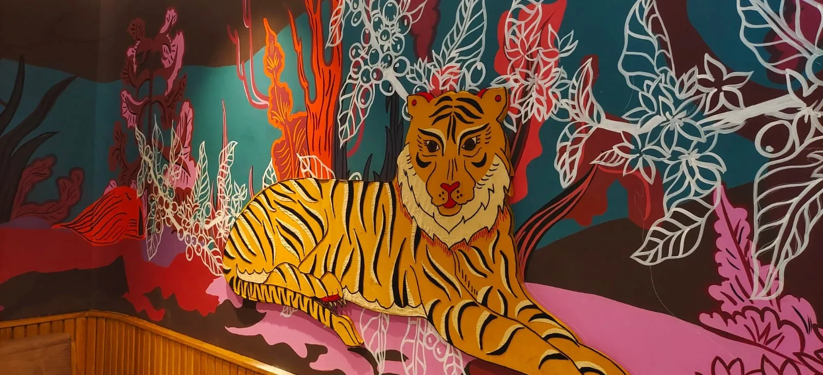The coffee-jungle mural at Starbucks Indiranagar, Bengaluru